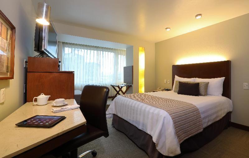 Emporio Reforma Hotell Mexico by Rom bilde A typical room at the hotel
